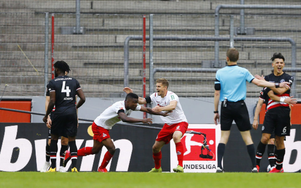 COLOGNE, GERMANY - MAY 24: FC Cologne's Jhon Cordoba celebrates after he scores his teams second goal during the Bundesliga match between 1. FC Koeln and Fortuna Duesseldorf at RheinEnergieStadion on May 24, 2020 in Cologne, Germany. (Photo by Pool/Thilo Schmuelgen/Pool via Getty Images)