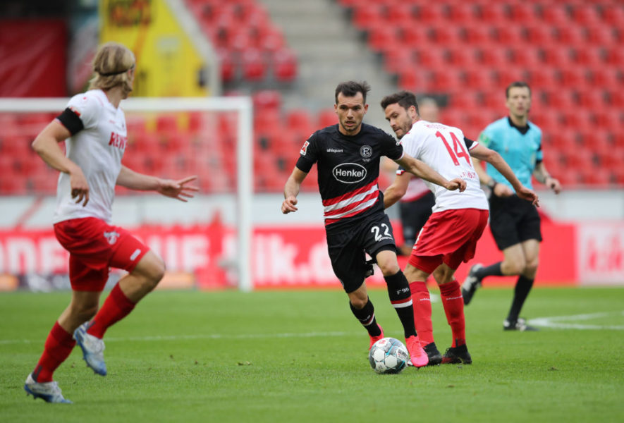 Fussball v.l. Kevin Stoeger, Jonas Hector Koeln Koeln, 24.05.2020, Fussball Bundesliga, 1. FC Koeln - Fortuna Duesseldorf Koeln, Christof Koepsel für Witters, DFL regulations prohibit any use of photographs as image sequences and/or quasi video. *** Football by Kevin Stoeger, Jonas Hector Cologne Cologne, 24 05 2020, Bundesliga Football, 1 FC Cologne Fortuna Duesseldorf Cologne Poolfoto WITTERS ,EDITORIAL USE ONLY