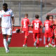 COLOGNE, GERMANY - JUNE 13: Anthony Modeste of 1. FC Koeln reacts as Christian Gentner of 1.FC Union Berlin (background) celebrates with his team mates after scoring his team's second goal during the Bundesliga match between 1. FC Koeln and 1. FC Union Berlin at RheinEnergieStadion on June 13, 2020 in Cologne, Germany. (Photo by Alexander Scheuber/Getty Images)