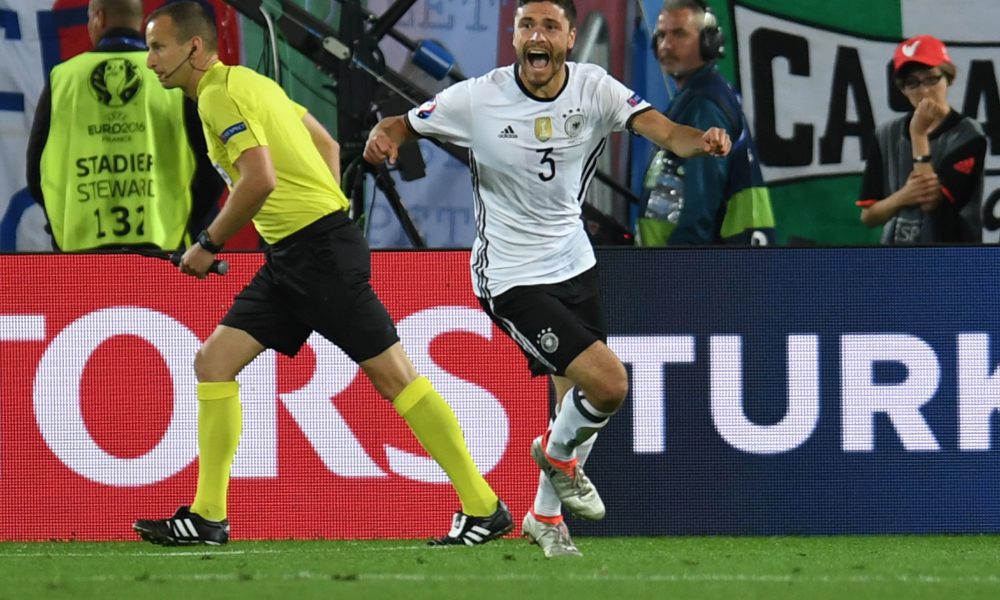 Germany's defender Jonas Hector celebrates after scoring a penalty kick during the Euro 2016 quarter-final football match between Germany and Italy at the Matmut Atlantique stadium in Bordeaux on July 2, 2016. / AFP / PATRIK STOLLARZ (Photo credit should read PATRIK STOLLARZ/AFP via Getty Images)