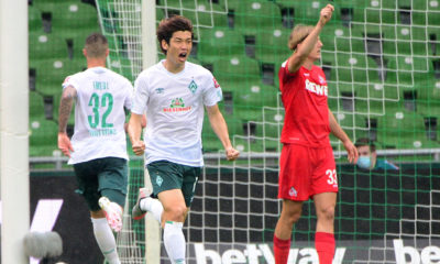 Bremen's Japanese forward Yuya Osako celebrates scoring the 1-0 during the German first division Bundesliga football match Werder Bremen v FC Cologne on June 27, 2020 in Bremen. (Photo by Patrik Stollarz / various sources / AFP) / DFL REGULATIONS PROHIBIT ANY USE OF PHOTOGRAPHS AS IMAGE SEQUENCES AND/OR QUASI-VIDEO (Photo by PATRIK STOLLARZ/AFP via Getty Images)