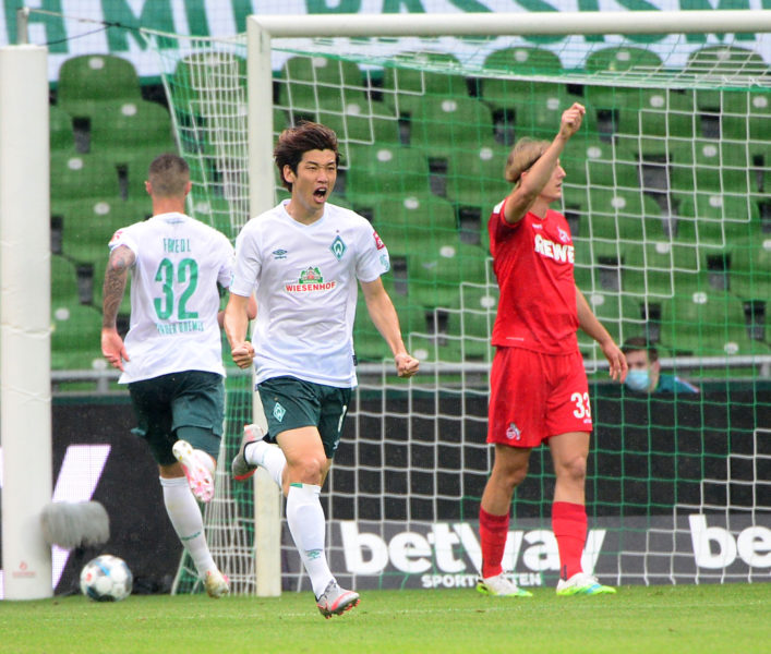 Bremen's Japanese forward Yuya Osako celebrates scoring the 1-0 during the German first division Bundesliga football match Werder Bremen v FC Cologne on June 27, 2020 in Bremen. (Photo by Patrik Stollarz / various sources / AFP) / DFL REGULATIONS PROHIBIT ANY USE OF PHOTOGRAPHS AS IMAGE SEQUENCES AND/OR QUASI-VIDEO (Photo by PATRIK STOLLARZ/AFP via Getty Images)