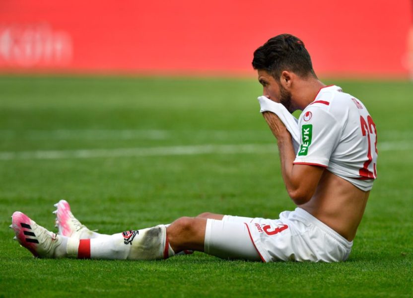 Cologne's German forward Mark Uth reacts on the pitch after the German first division Bundesliga football match FC Cologne v FC Union Berlin on June 13, 2020 in Cologne, western Germany. (Photo by Martin Meissner / POOL / AFP) / DFL REGULATIONS PROHIBIT ANY USE OF PHOTOGRAPHS AS IMAGE SEQUENCES AND/OR QUASI-VIDEO (Photo by MARTIN MEISSNER/POOL/AFP via Getty Images)v