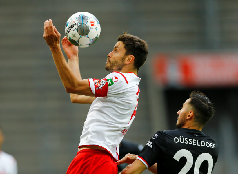 Cologne's German defender Jonas Hector (L) and Fortuna Duesseldorf's German forward Steven Skrzybski vie for the ball during the German first division Bundesliga football match FC Cologne v Fortuna Dusseldorf on May 24, 2020 in Cologne, western Germany. (Photo by Thilo SCHMUELGEN / POOL / AFP) / DFL REGULATIONS PROHIBIT ANY USE OF PHOTOGRAPHS AS IMAGE SEQUENCES AND/OR QUASI-VIDEO (Photo by THILO SCHMUELGEN/POOL/AFP via Getty Images)