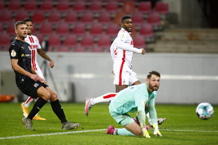 COLOGNE, GERMANY - DECEMBER 22: Anthony Modeste of 1.FC Koeln scores their team's first goal during the DFB Cup second round match between 1. FC Koeln and VfL Osnabrueck at RheinEnergieStadion on December 22, 2020 in Cologne, Germany. Sporting stadiums around Germany remain under strict restrictions due to the Coronavirus Pandemic as Government social distancing laws prohibit fans inside venues resulting in games being played behind closed doors. (Photo by Thilo Schmuelgen - Pool/Getty Images)