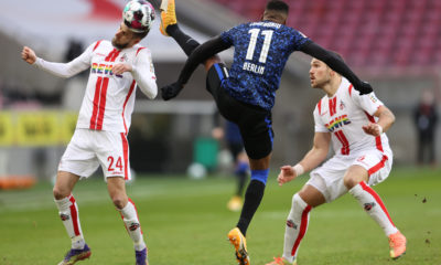 COLOGNE, GERMANY - JANUARY 16: Dominick Drexler of 1. FC Koln is challenged by Dodi Lukebakio of Hertha BSC during the Bundesliga match between 1. FC Koeln and Hertha BSC at RheinEnergieStadion on January 16, 2021 in Cologne, Germany. Sporting stadiums around Germany remain under strict restrictions due to the Coronavirus Pandemic as Government social distancing laws prohibit fans inside venues resulting in games being played behind closed doors. (Photo by Lars Baron/Getty Images)