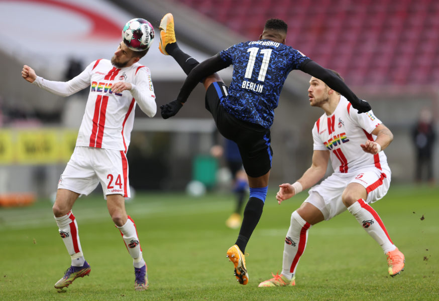 COLOGNE, GERMANY - JANUARY 16: Dominick Drexler of 1. FC Koln is challenged by Dodi Lukebakio of Hertha BSC during the Bundesliga match between 1. FC Koeln and Hertha BSC at RheinEnergieStadion on January 16, 2021 in Cologne, Germany. Sporting stadiums around Germany remain under strict restrictions due to the Coronavirus Pandemic as Government social distancing laws prohibit fans inside venues resulting in games being played behind closed doors. (Photo by Lars Baron/Getty Images)