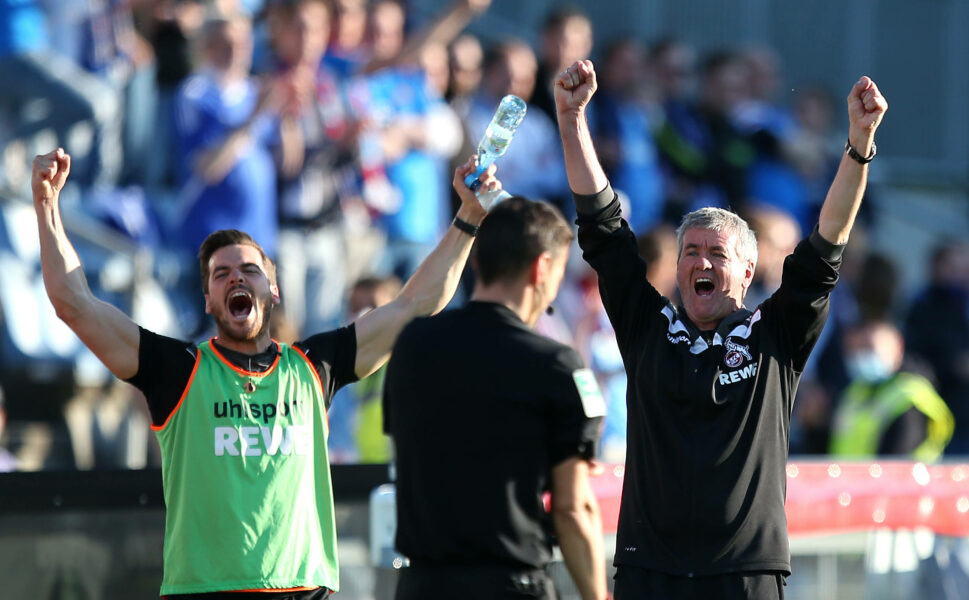 29.05.2021, Fussball Relegation 2020/2021, Rückspiel, Holstein Kiel - 1. FC Köln, im Holstein-Stadion Kiel. Schlussjubel L-R Athletiktrainer Leif Frach Köln und Trainer Friedhelm Funkel Köln ***DFL and DFB regulations prohibit any use of photographs as image sequences and/or quasi-video.*** *** 29 05 2021, Football Relegation 2020 2021, Second leg, Holstein Kiel 1 FC Köln, at Holstein Stadion Kiel Final cheer L R Athletics coach Leif Frach Cologne and coach Friedhelm Funkel Cologne DFL and DFB regulations prohibit any use of photographs as image sequences and or quasi video